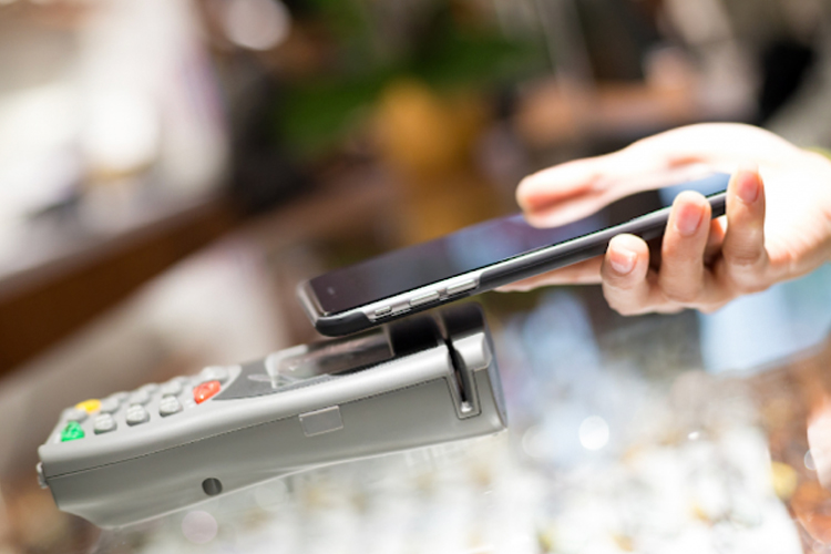 Mobile payment being used. 