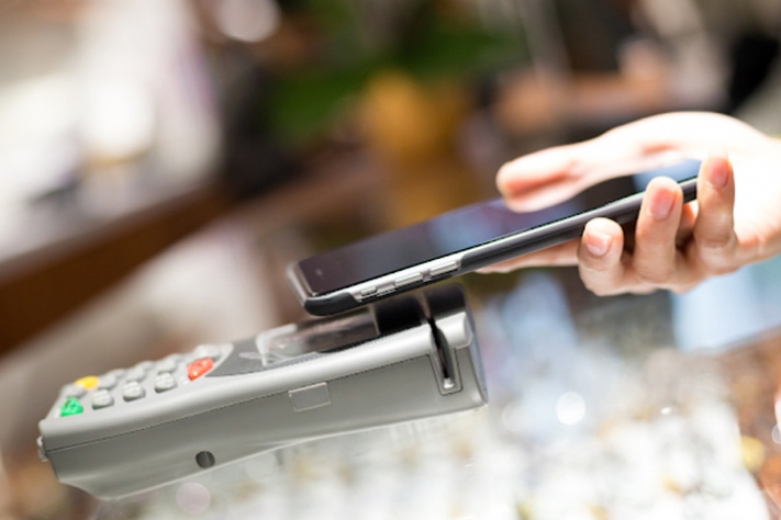 Mobile payment being used. 